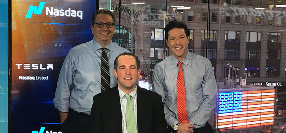 CNBC Closing Bell Hosts join Pat Shannon '03 (middle) at Nasdaq in Times Square