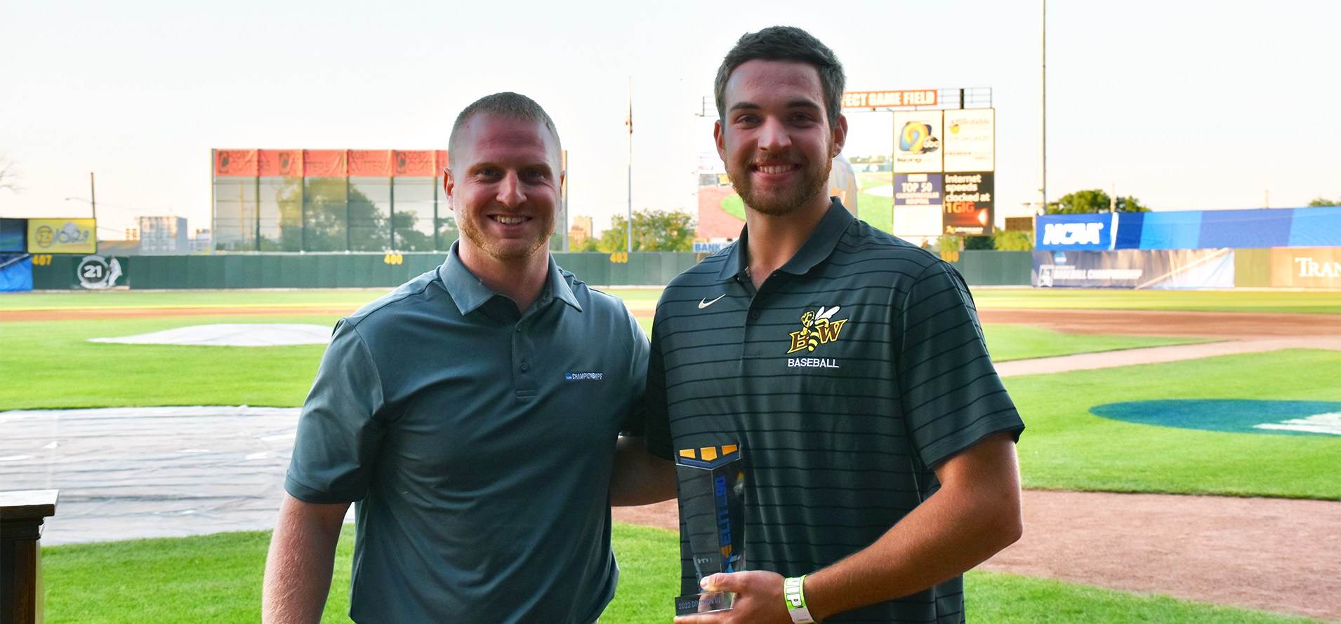 Aaron King of NCAA presenting the Elite 90 Academic Recognition Award to Luke Vonderhaar