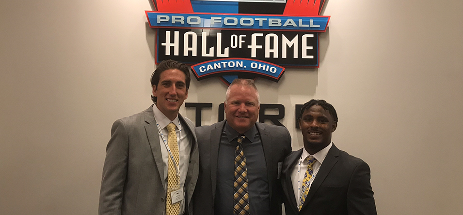Senior QB A.J. Miller, Head Coach Jim Hilvert and Senior DB Jordyn Johnson