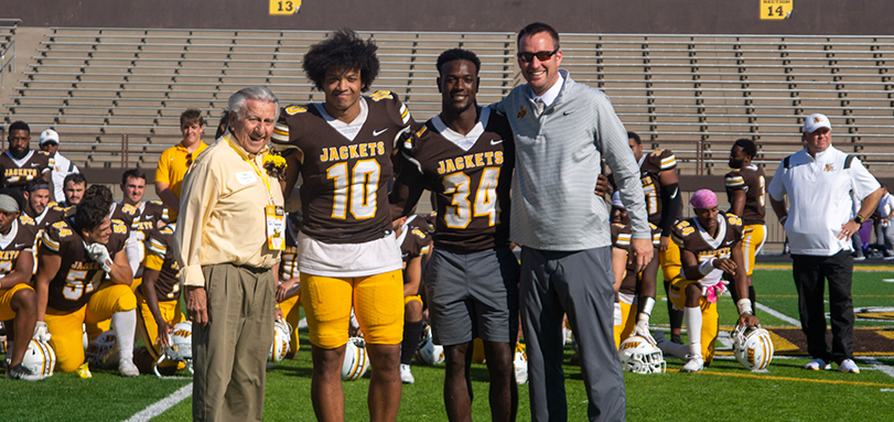 Bold & Gold Grand Marshal Ted Theodore, Sekou Imani, Jon Murray, Jr. and Director of Athletics Steve Thompson
