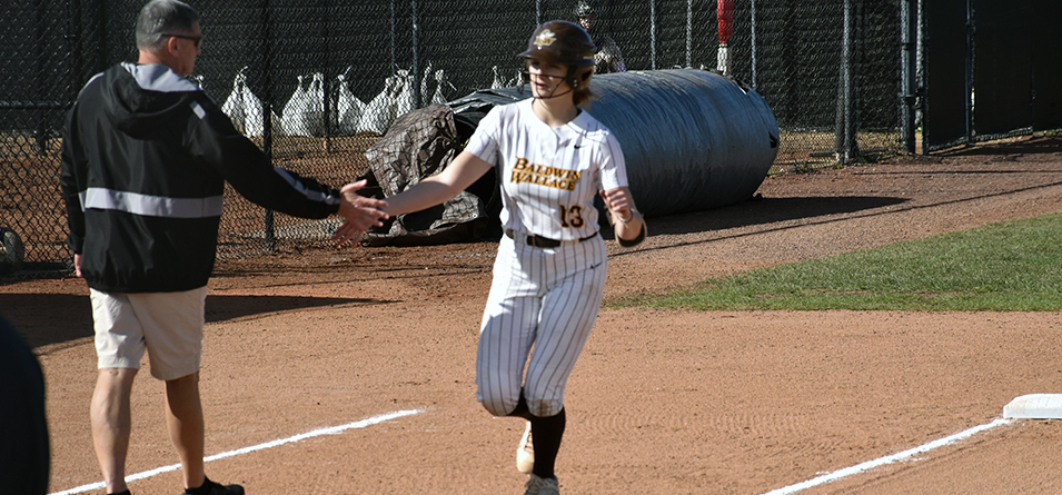Maddie Lester rounding third after first career homerun